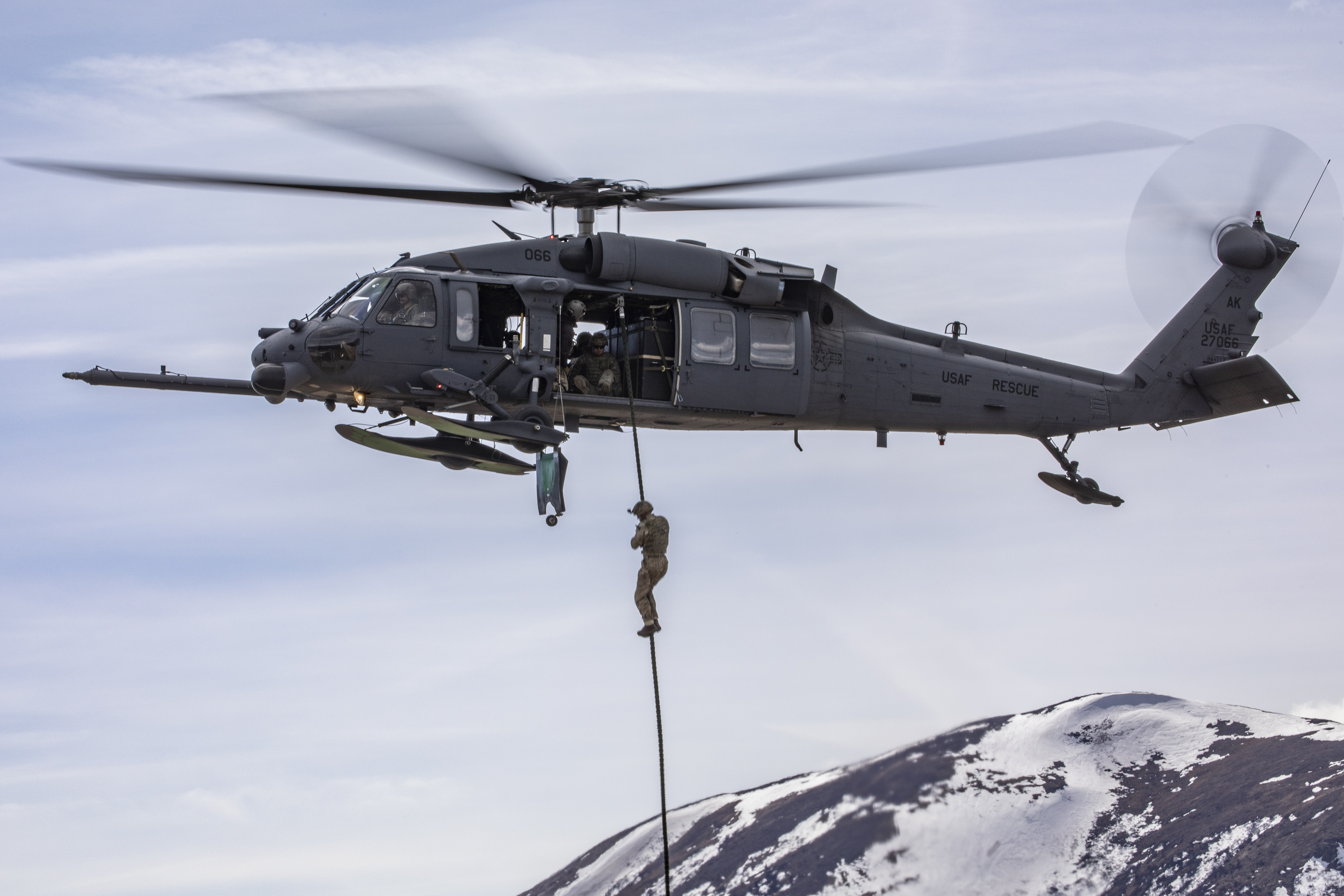 Apache delivers personnel down wire.